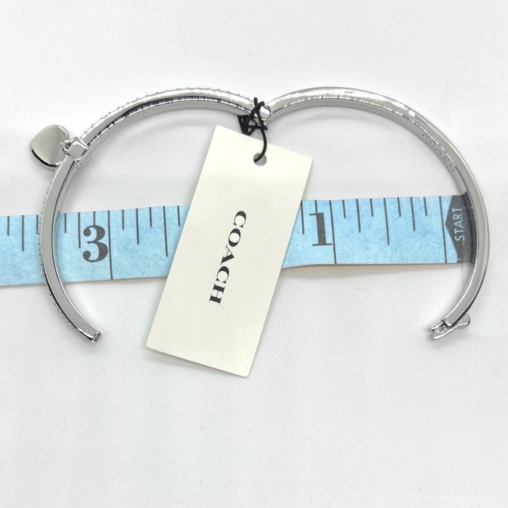 Coach Silver Crystal Heart Charm Hinged Bangle Bracelet NWT $125 MSRP & Dust Bag - Picture 10 of 11
